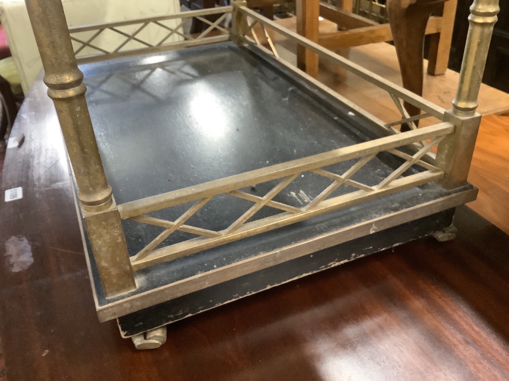 An ebonised brass and lacquer drinks trolley, width 77cm, depth 44cm, height 66cm